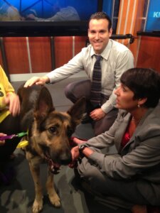 Matt DeSarle works with Lara on dog segment at KMBCTV