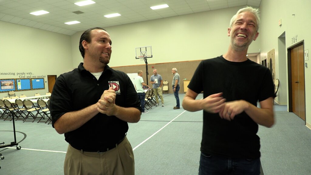 Matt DeSarle and Eric Scherbarth share a laugh